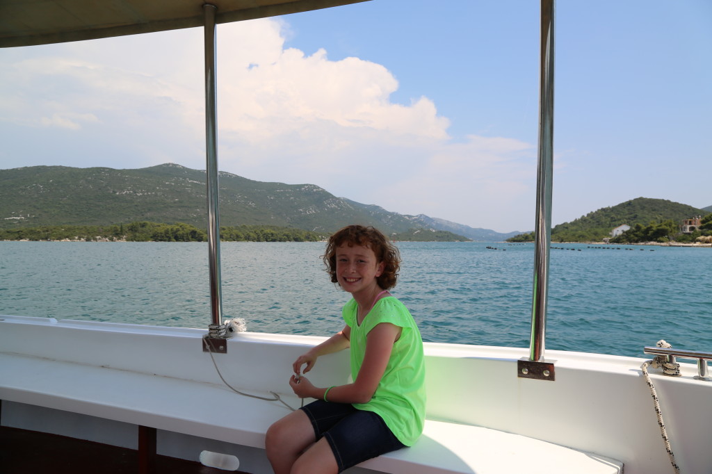 Syd on the boat during the oyster farm tour.